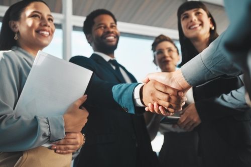 Business partners shaking hands